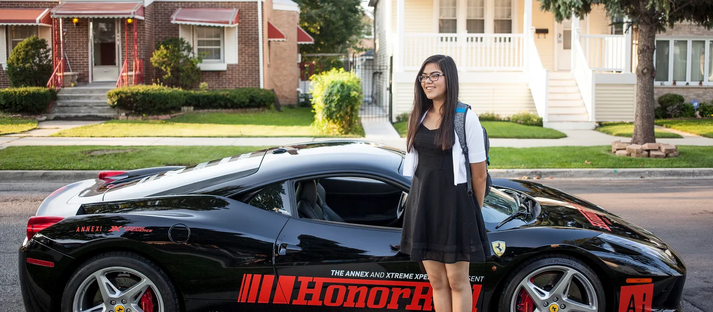 Student delivered to school in a Honor Roll-branded Ferrari
